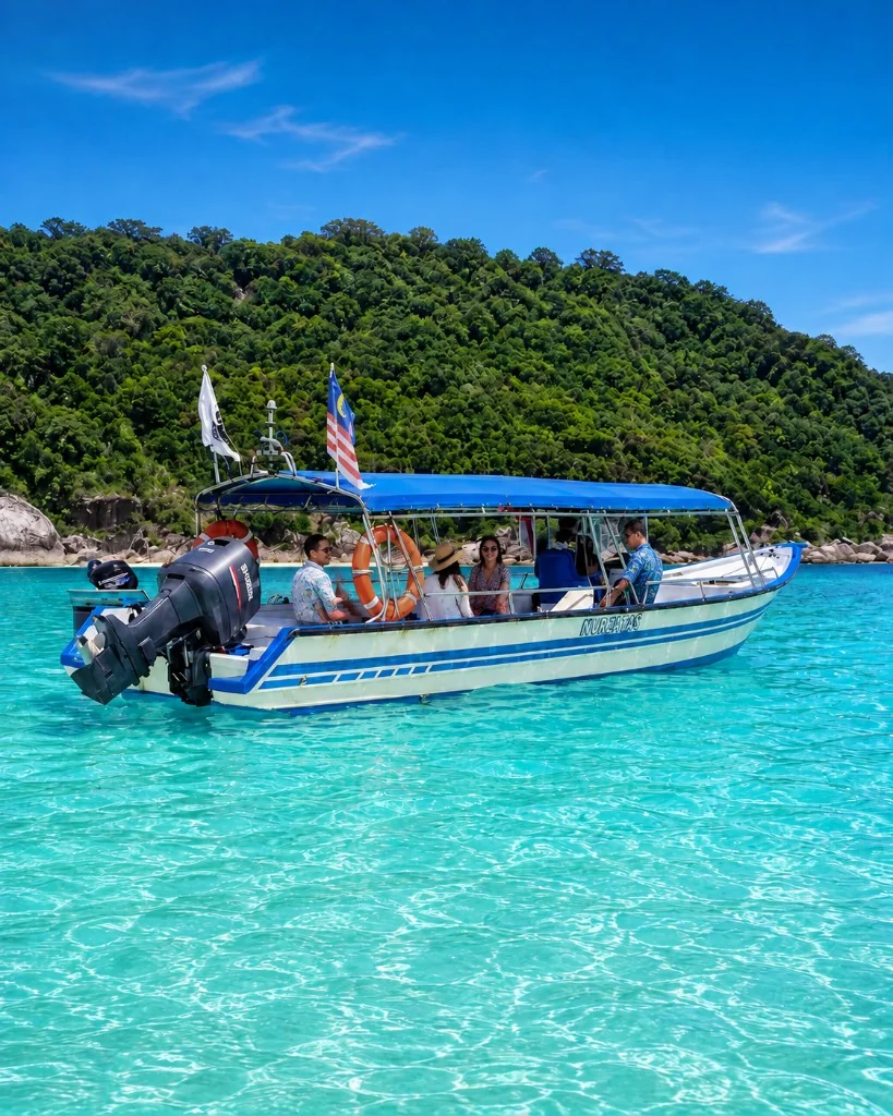 Eagle Bay Retreat boat trip on crystal-clear waters at the Tip of Borneo