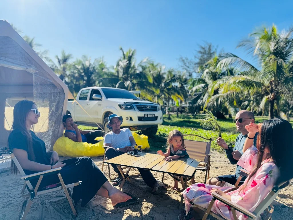 Eagle Bay Retreat tent guests relaxing outside